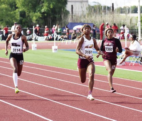 Na’Kayla Conner (center) sprints toward the finish line in the 3A girls 100-meter dash at last week’s Region III-Class 3A Meet in Waco. Conner won the event to advance to state. Photo by Ryan Heller/Cameron Herald