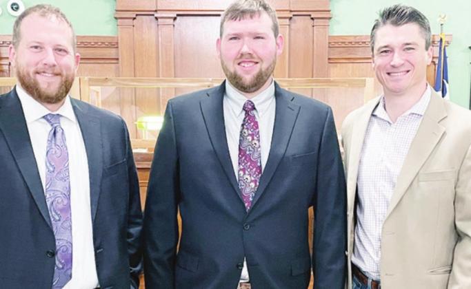 Leon County District Attorney Caleb Henson, Leon County Assistant District Attorney Zane Robinson, and Freestone County District Attorney Brian Evans on Monday morning after Robinson was sworn-in.